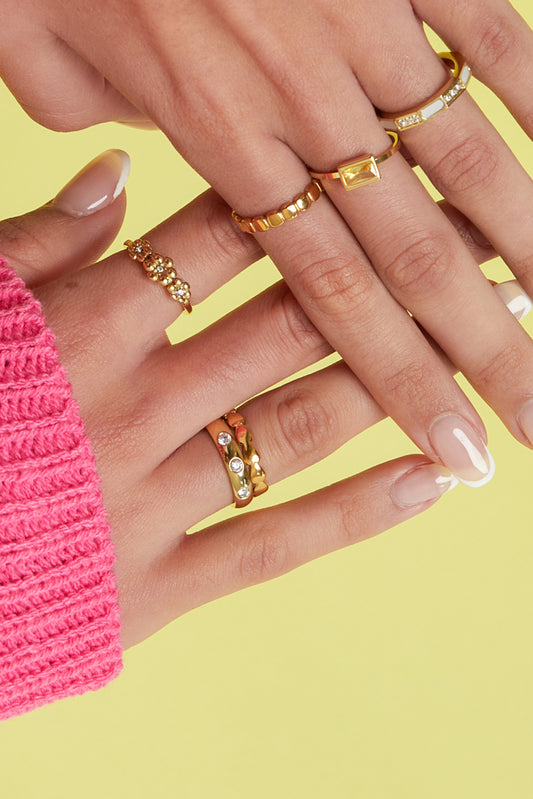 Minimalist ring with small hearts